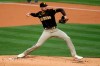 San Diego Padres starting pitcher Joe Musgrove throws to a Los Angeles Dodgers batter during the first inning of a baseball game in Los Angeles, Sunday, April 25, 2021. (AP Photo/Alex Gallardo)