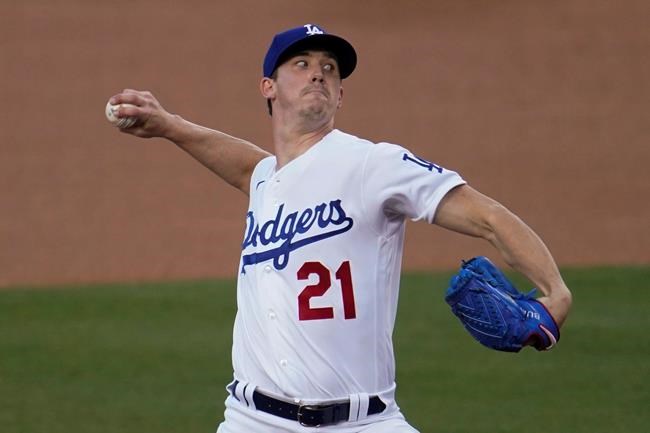 Los Angeles Dodgers starting pitcher Walker Buehler throws to an Arizona Diamondbacks batter during the first inning of a baseball game Wednesday, Sept. 2, 2020, in Los Angeles. (AP Photo/Marcio Jose Sanchez)