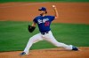 Los Angeles Dodgers starting pitcher Clayton Kershaw throws to the plate during intrasquad play in the restart of baseball spring training Monday, July 6, 2020, in Los Angeles. (AP Photo/Mark J. Terrill)