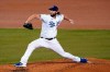 Los Angeles Dodgers starting pitcher Clayton Kershaw throws to a Milwaukee Brewers batter during the third inning in Game 2 of a National League wild-card baseball series Thursday, Oct. 1, 2020, in Los Angeles. (AP Photo/Ashley Landis)