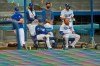 Los Angeles Dodgers manager Dave Roberts, center left, and Justin Turner, center right, watch along with other members of the team during an intrasquad baseball game Thursday, July 9, 2020, in Los Angeles. (AP Photo/Mark J. Terrill)