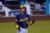 Milwaukee Brewers' Orlando Arcia flips his bat after striking out during the fourth inning in Game 2 of the team's National League wild-card baseball series against the Los Angeles Dodgers on Thursday, Oct. 1, 2020, in Los Angeles. (AP Photo/Ashley Landis)