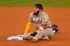 San Diego Padres' Fernando Tatis Jr. takes a breather after stealing second during the eighth inning of a baseball game against the Los Angeles Dodgers Monday, Aug. 10, 2020, in Los Angeles. (AP Photo/Mark J. Terrill)