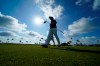 Cole Hammer of the USA team walks down a fairway as he practices for the Walker Cup golf tournament, starting tomorrow, at Seminole Golf Club in Juno Beach, Fla., Friday, May 7, 2021. (AP Photo/Gerald Herbert)