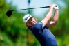 Cameron Smith, of Australia, hits off the second tee during the final round of the PGA Zurich Classic golf tournament at TPC Louisiana in Avondale, La., Sunday, April 25, 2021. (AP Photo/Gerald Herbert)