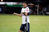 Vancouver Whitecaps defender Cristian Gutierrez (3) reacts to a call during the first half of an MLS soccer match against the Sporting Kansas City, Sunday, July 26, 2020, in Kissimmee, Fla. (AP Photo/John Raoux)