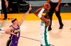 Boston Celtics' Jaylen Brown shoots over Los Angeles Lakers' Alex Caruso (4) during the first half of an NBA basketball game, Thursday, April 15, 2021, in Los Angeles. (AP Photo/Ringo H.W. Chiu)