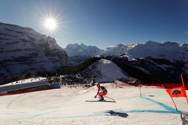 FILE - In this Saturday, Jan. 19, 2019 file photo, Monaco's Arnaud Alessandria speeds down the course during an alpine ski, men's World Cup downhill in Wengen, Switzerland. The signature Alpine skiing race in Switzerland risks being dropped from the World Cup schedule in a money dispute with the national ski federation. Organizers traded statements with Swiss-Ski on Wednesday May 20, 2020, and confirmed their ongoing legal case at the Court of Arbitration for Sport. (AP Photo/Gabriele Facciotti, File)