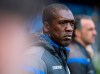 FILE - In this Sunday, April 29, 2018 file photo, Deportivo's coach Clarence Seedorf looks on during their Spanish La Liga soccer match against Barcelona at the Riazor stadium in A Coruna, Spain. Players should get a yellow card for covering their mouth to speak to an opponent, soccer great Clarence Seedorf told European lawmakers Wednesday April 14, 2021, in a debate on hate speech in sport. Seedorf spoke to the 47-nation Council of Europe on the day UEFA was preparing a verdict in the disciplinary case of a Slavia Prague player alleged to have racially insulted a Black opponent from Rangers last month. (AP Photo/Lalo R. Villar, file)