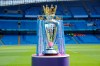 FILE - In this Sunday, May 6, 2018 file photo, the English Premier League trophy is displayed on the pitch prior to the English Premier League soccer match between Manchester City and Huddersfield Town at Etihad stadium in Manchester, England. Steve Parish, the chairman of Crystal Palace, says the Premier League could face years of legal challenges if this season is not completed due to the coronavirus pandemic. (AP Photo/Rui Vieira, File)