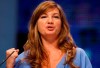 FILE - In this Sunday, Sept. 28, 2008 file photo, Karren Brady, managing director of Birmingham City Football Club gives a speech at The Conservative Party Conference in Birmingham, England. West Ham chief executive Karren Brady believes the timescale for a Premier League return is no clearer than when the coronavirus lockdown started. The EPL stated after talks with the clubs on Friday April 17, 2020, that its objective remains to complete the season. But Brady feels questions need to be answered over player training, the presence of police at matches, virus testing and medical protocols (AP Photo/Kirsty Wigglesworth, File)
