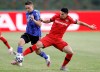 FILE - In this Tuesday, June 9, 2020 file photo, Saarbruecken's Mario Mueller, left, and Leverkusen's Paulinho challenge for the ball during the German soccer cup, DFB Pokal, semifinal match between 1. FC Saarbruecken and Bayer 04 Leverkusen in Voelklingen, Germany. Bayer Leverkusen will be without Brazilian forward Paulinho for the German Cup final and the Europa League mini-tournament after he tore an anterior cruciate ligament in his knee, the club said Thursday July 2, 2020. (Ronald Wittek/Pool Photo via AP)