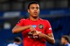 FILE - In this Tuesday, June 30, 2020 file photo, Manchester United's Mason Greenwood celebrates after scoring the opening goal of his team during the English Premier League soccer match between Brighton & Hove Albion and Manchester United at the AMEX Stadium in Brighton, England. England players Phil Foden and Mason Greenwood have been dropped for Tuesday's game against Denmark after breaching coronavirus rules in Iceland. They will return to England from Reykjavik rather than traveling to Copenhagen on Monday Sept. 7, 2020, after social media video was published in Iceland purporting to show the players meeting women from outside the team bubble. (Mike Hewitt/Pool via AP, File)