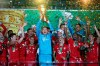 FILE - In this Saturday, July 4, 2020 file photo, Bayern Munich players celebrate after winning the trophy in the German soccer cup (DFB Pokal) final match between Bayer 04 Leverkusen and FC Bayern Munich in Berlin, Germany. German soccer club Union Furstenwalde could have had the game of a lifetime. The small club was due to host Bundesliga team Wolfsburg in the first round of the German Cup but the coronavirus pandemic meant that wasn't possible. (AP Photo/Michael Sohn, File)