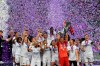 FILE - In this Saturday, May 18, 2019 file photo, Olympique Lyon players celebrate with the trophy after they defeated FC Barcelona 4-1 in the women's soccer Champions League final match at the Groupama Arena in Budapest, Hungary. Europe’s top teams are preparing for the resumption of the Women’s Champions League at a knockout tournament in Spain. Defending champion Lyon is seeking its fifth straight title and is the side to beat. The tournament is scheduled to begin Aug. 21, 2020. (Tibor Illyes/MTI via AP, File)