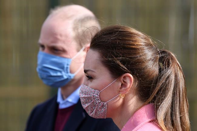 Britain's Prince William and Kate, Duchess of Cambridge arrive for a visit to School21, a school in east London, Thursday March 11, 2021. (Justin Tallis/Pool via AP)