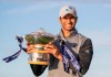 England's Aaron Rai celebrates with the trophy after winning the Scottish Open at The Renaissance Club, North Berwick, Scotland, Sunday Oct. 4, 2020. (Jane Barlow/PA via AP)