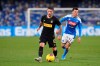 Inter's Stefano Sensi, left, and Napoli's Hirving Lozano battle for the ball during the Serie A soccer match between Napoli and Inter Milan at the San Paolo stadium Naples, Italy, Monday Jan. 6, 2020. (Cafaro/LaPresse via AP)