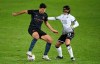Manchester City's Rodri, left, and Swansea City's Yan Dhanda battle for the ball during the English FA Cup fifth round soccer match at Liberty Stadium, Swansea, Wales, Wednesday Feb. 10, 2021. (Nick Potts/PA via AP)