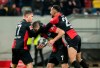 Berlin's Krzysztof Piatek, center, celebrates scoring against Duesseldorf with teammates Maximilian Mittelst'dt, left, and Matheus Cunha during the Bundesliga soccer match in the Merkur Spiel-Arena, Duesseldorf, Germany, Friday Feb. 28, 2020. (Bernd Thissen/dpa via AP)