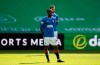 Rangers' Glen Kamara stands instead of taking a knee prior to the Scottish Premiership soccer match at Celtic Park, Glasgow, Sunday March 21, 2021. Glasgow's rival soccer teams stood rather than taking a knee in a pre-match solidarity before the derby at Celtic after Rangers midfielder Glen Kamara faced racial abuse in a European match.(Andrew Milligan/PA via AP)
