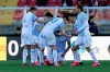 Spal's Andrea Petagna, kneeling, celebrates with teammates after scoring during the Serie A soccer match between Lecce and Spal, at the Via del Mare Stadium in Lecce, Italy, Saturday, Feb. 15, 2020. (Donato Fasano/Lapresse via AP)