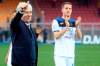 Atalanta coach Gian Piero Gasperini, left, and forward Mario Pasalic wave to fans at the end of the Serie A soccer match between Lecce and Atalanta, at the Via del Mare Stadium in Lecce, Italy, Sunday, March 1, 2020. Atalanta trashed Lecce 7-2. (Donato Fasano/LaPresse via AP)