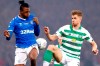 Rangers' Joe Aribo, left, and Celtic's Greg Taylor battle for the ball during the Scottish Cup Final at Hampden Park, Glasgow, Scotland, Sunday, Dec. 8, 2019. (Jeff Holmes/PA via AP)