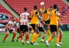 Wolverhampton Wanderers' Romain Saiss heads in his sides second goal during the English League Cup soccer match between Sheffield United and Wolves at Bramall Lane stadium in Sheffield, England Monday, Sept. 14, 2020. (Peter Powell/Pool via AP)
