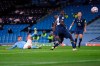 Manchester City's Ferran Torres, left, scores his sides third goal during the Champions League group C soccer match between Manchester City and FC Porto at the Etihad stadium in Manchester, England, Wednesday, Oct. 21, 2020. (Laurence Griffiths/Pool via AP)