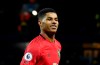 FILE - In this Saturday, Dec. 7, 2019 file photo, Manchester United's Marcus Rashford celebrates during an English Premier League soccer match against Manchester City at Etihad stadium in Manchester, England. British Prime Minister Boris Johnson faced growing pressure Tuesday, June 16, 2020 to make a policy U-turn as opponents and allies alike rallied behind a young soccer star’s campaign to help families struggling with food poverty. Manchester United and England player Marcus Rashford is urging the government to provide free meals for needy students over the summer holidays.(AP Photo/Rui Vieira, file)