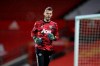 FILE - In this Saturday Feb. 6, 2021 file photo, Manchester United's goalkeeper David de Gea warms up before their English Premier League soccer match against Everton at the Old Trafford stadium in Manchester, England. Manchester United manager Ole Gunnar Solskjaer says goalkeeper David De Gea will have “the time he needs” before returning to the team following a trip to Spain for the birth of his child. De Gea is unavailable for the Manchester derby on Sunday, March 7 and missed Wednesday’s 0-0 draw with Crystal Palace after he and his girlfriend traveled to Spain for the birth. (Alex Pantling/Pool via AP, file)