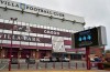 FILE - This Saturday, Nov. 21, 2020 file photo shows a general view of a social distancing message on display outside the Villa Park stadium, home of Aston Villa, in Birmingham, England. Aston Villa has on Thursday, Jan. 7, 2021 reported a “significant” coronavirus outbreak and closed its training ground a day before a scheduled FA Cup home game against Liverpool. Villa says “discussions are ongoing between medical representatives of the club, the Football Association and the Premier League.” (AP Photo/Rui Vieira, file)