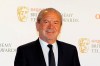 FILE - In this Sunday, May 27, 2012 file photo, British businessman Alan Sugar attends at the British Academy Television Awards in London. Former Tottenham chairman Alan Sugar says the Premier League is facing a “lot of problems” due to the coronavirus pandemic as they struggle to pay bills with the competition indefinitely suspended. Sugar tells on Friday, April 10, 2020 The Associated Press that “I fear for some clubs.” (AP Photo/Kirsty Wigglesworth, file)