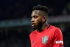 FILE - In this Wednesday, Dec. 4, 2019 file photo, Manchester United's Fred looks on during their English Premier League soccer match against Tottenham Hotspur at Old Trafford in Manchester, England. Manchester United midfielder Fred says he finally feels settled at the club after what he described as an “awful