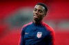 FILE - In this Wednesday, Nov. 14, 2018 file photo, United States national soccer team player Timothy Weah attends a training session at Wembley Stadium in London. US international Timothy Weah made his comeback from injury as a late substitute for French club Lille on Sunday, Aug, 30, 2020. The 20-year-old Weah came on in the 78th minute for Turkey forward Burak Yilmaz in a 1-0 win at Reims. (AP Photo/Tim Ireland, file)