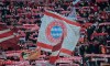 FILE - In this Wednesday, March 11, 2015 file photo, Bayern fans wave flags and scarfs before their Champions League soccer match against Shakhtar Donetsk in Munich, southern Germany. Even though the protests have stopped amid the coronavirus outbreak, many Bayern Munich fans are still pushing for their club to take its Qatari sponsor to task for human rights abuses in the country. Bayern is sponsored by state-owned carrier Qatar Airways and has been holding mid-season training camps in the Persian Gulf country since 2011.(AP Photo/Kerstin Joensson, file)