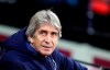 FILE - In this Monday, Dec. 9, 2019 file photo, West Ham's manager Manuel Pellegrini looks out from the bench before their English Premier League soccer match against Arsenal at the London Stadium in London. Real Betis says that Manuel Pellegrini has agreed to coach the Spanish club next season on a contract that will last through 2023. The deal was announced Thursday, July 9, 2020. (AP Photo/Kirsty Wigglesworth, file)