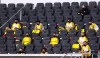 FILE - In this Sunday, May 31, 2020, substitutes for Borussia Dortmund, wearing face masks to protect against coronavirus, look on from the stands during the German Bundesliga soccer match between SC Paderborn 07 and Borussia Dortmund at Benteler Arena in Paderborn, Germany. The German Bundesliga will keep five substitutions for the 2020-21 season because of the coronavirus pandemic. The 36 clubs in the top two German men’s soccer leagues voted at a German Football League meeting Thursday, Sept. 3, 2020 to continue the rule for next season. (Lars Baron/Pool via AP, file)