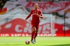 FILE - In this Sunday, July 5, 2020 file photo, Liverpool's Virgil van Dijk runs with the ball during theie English Premier League soccer match against Aston Villa at Anfield Stadium in Liverpool, England. Liverpool ended a 30-year wait for a league title in style last season as Jurgen Klopp‚Äôs men lost only three times en route to lifting the trophy last month - retaining the crown is often a more difficult proposition, however, and the Reds will have to remain at their best if they are to do so. (Carl Recine/Pool via AP, file)
