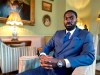 Moses Swaibu poses for a photograph during an interview with the Associated Press in London, Monday, Dec. 7, 2020. A former professional soccer play who was jailed in 2015 for match fixing allegations fears the financial crisis in the game caused by the coronavirus could make players more vulnerable to taking bribes. Moses Swaibu tells The Associated Press a match fixer has a potential “pool of people he can manipulate.”