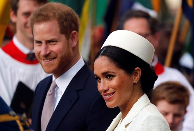 FILE - In this Monday, March 11, 2019 file photo, Britain's Prince Harry and Meghan, the Duchess of Sussex leave after the Commonwealth Service at Westminster Abbey in London. Prince Harry and Meghan Markle are to no longer use their HRH titles and will repay £2.4 million of taxpayer's money spent on renovating their Berkshire home, Buckingham Palace announced Saturday, Jan. 18. 2020. (AP Photo/Frank Augstein, file)
