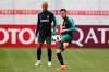 FILE - In this Wednesday, June 13, 2018 file photo, Portugal's Bernardo Silva, right, plays the ball next to teammate Joao Mario during the training session in Kratovo, outskirts Moscow, Russia. Portugal midfielder Joao Mario has on Tuesday, Dec. 3, 2019 defended compatriot Bernardo Silva against racism, saying it was “strange” the Manchester City playmaker was punished for a tweet to teammate Benjamin Mendy. (AP Photo/Francisco Seco, file)