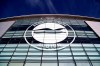 FILE - This Jan, 18, 2020 file photo shows a general view of the club crest on the side of the AMEX Stadium, home to Brighton & Hove Albion, Brighton, England. A Brighton player tested positive for the coronavirus as Premier League clubs prepare for talks on Monday, May 11 about how to resume the competition during the pandemic. The southern England club told The Associated Press there is no need for other members of the squad or coaches to self-isolate because players have only worked in isolation when at the training base. (Gareth Fuller/PA via AP, file)