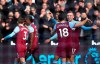 West Ham United's Jarrod Bowen, right, celebrates with teammates after scoring his side's first goal of the game during their English Premier League soccer match against Southampton at London Stadium, in London, Saturday, Feb. 29, 2020. (Victoria Jones/PA via AP)
