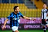 Inter's Alexis Sanchez celebrates after scoring during the Serie A soccer match between Parma and Inter Milan, at the Ennio Tardini Stadium in Parma, Italy, Thursday, March 4, 2021. (Massimo Paolone/LaPresse via AP)