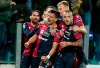 Cagliari's Giovanni Simeone, second left, celebrates with his teammates after scoring the first goal of the game during the Italian Serie A soccer match between Cagliari Calcio and SS Lazio at Sardegna Arena stadium in Cagliari, Italy, Monday, Dec. 16, 2019. (Fabio Murru/ANSA via AP)