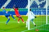 Berlin's Taiwo Awoniyi, center, fails to score past Hoffenheim goalkeeper Oliver Baumann during their German Bundesliga soccer match at the PreZero-Arena in Sinsheim, Germany, Monday, Nov, 2, 2020. (Uwe Anspach/dpa via AP)
