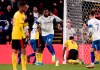 Tranmere Rovers's Emmanuel Monthe celebrates scoring his side's second goal of the game during the English FA Cup third round soccer match between Watford and Tranmere Rovers at Vicarage Road, Watford, England, Saturday, Jan. 4, 2020. (John Walton/PA via AP)
