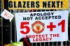 Banners near the stadium as fans protest against the Glazer family, owners of Manchester United, before their Premier League match against Liverpool at Old Trafford, Manchester, England, Sunday, May 2, 2021. (Barrington Coombs/PA via AP)